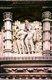 India: Hindu deity with characteristic full-breasted consort, Kandariya Mahadev Temple, Khajuraho, Madhya Pradesh State